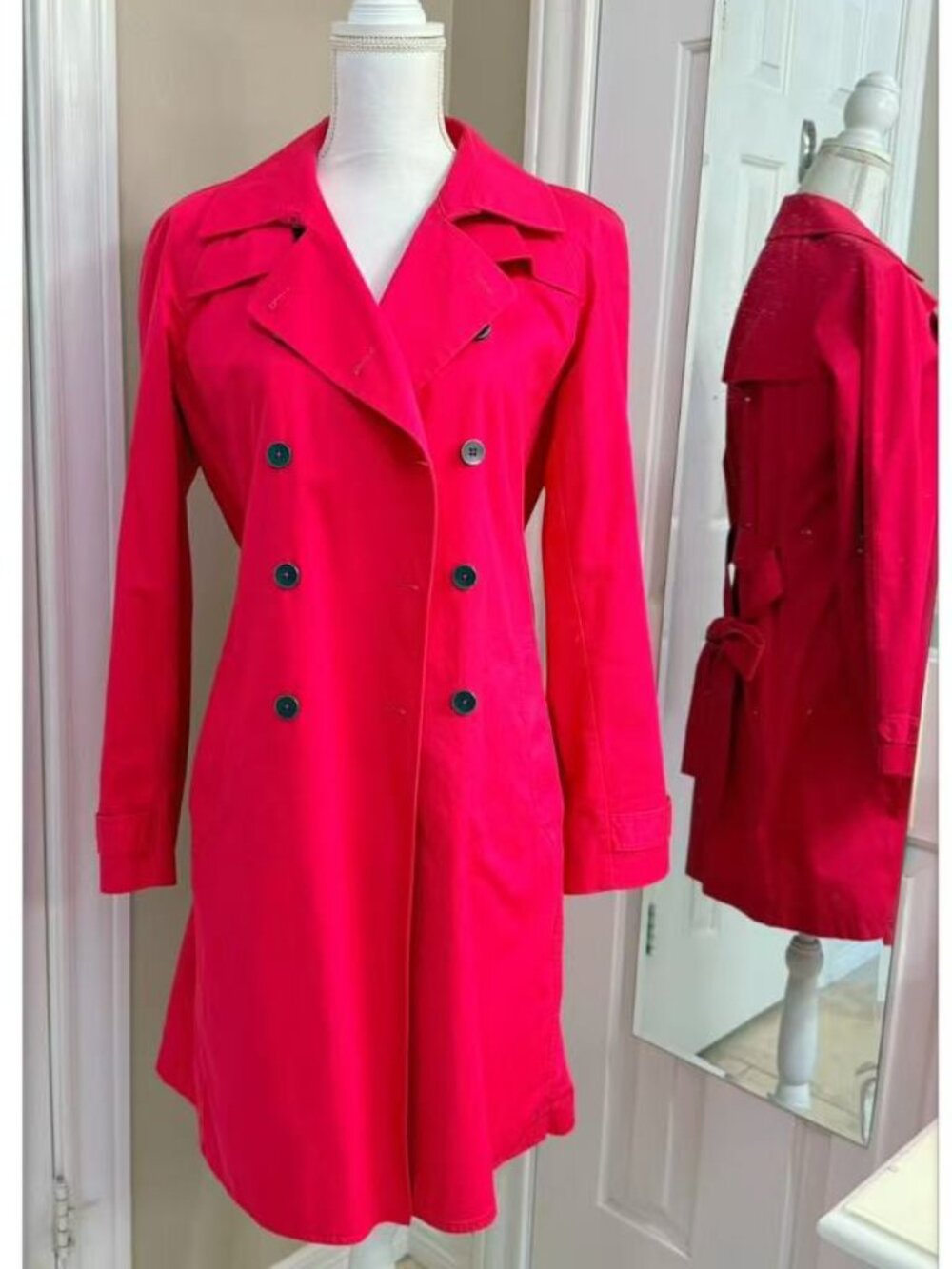 Double-breasted hot pink trench coat with a matching tie belt size